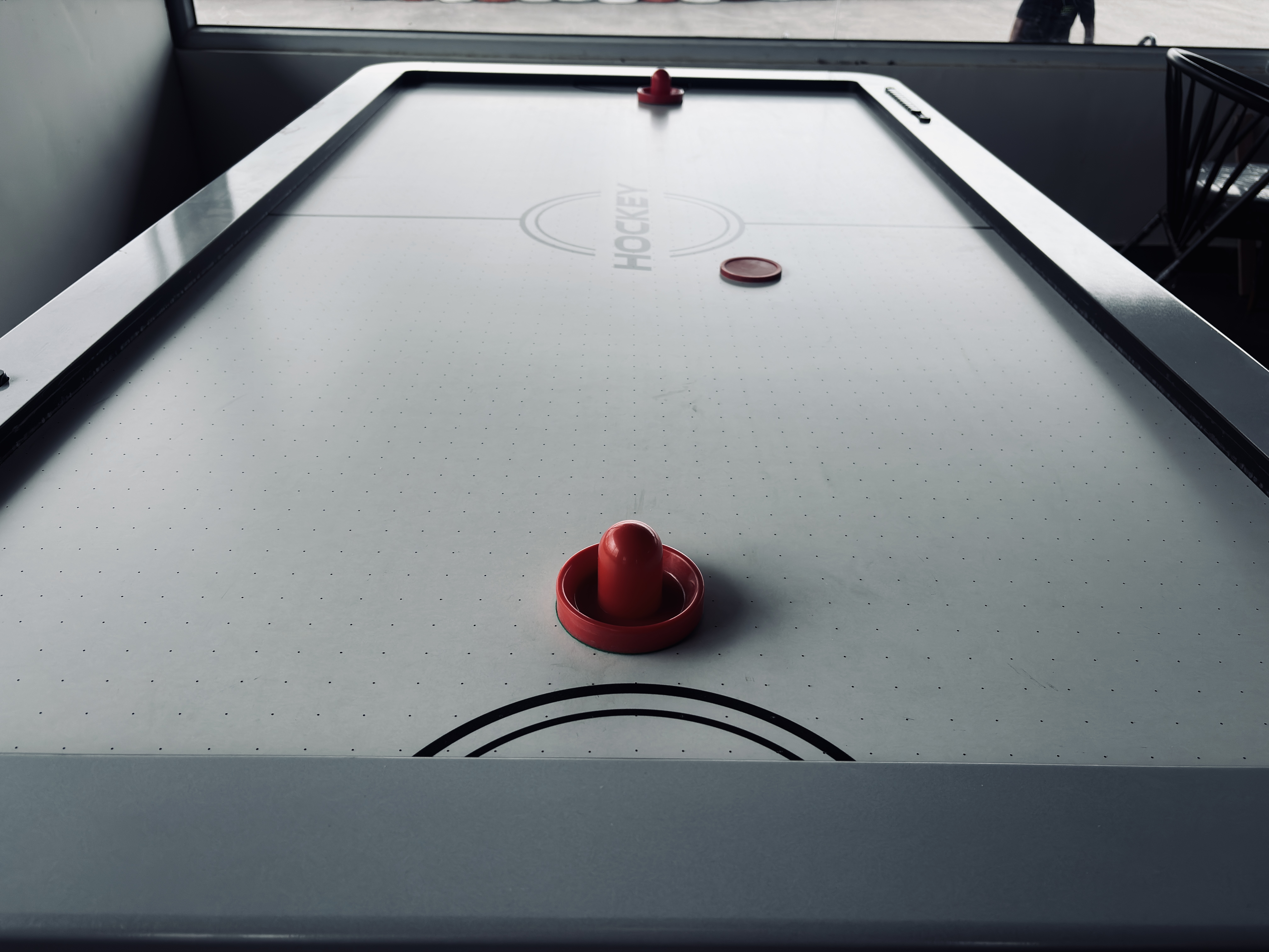 Arcade games and air hockey in Arena53 Play Zone Bangalore